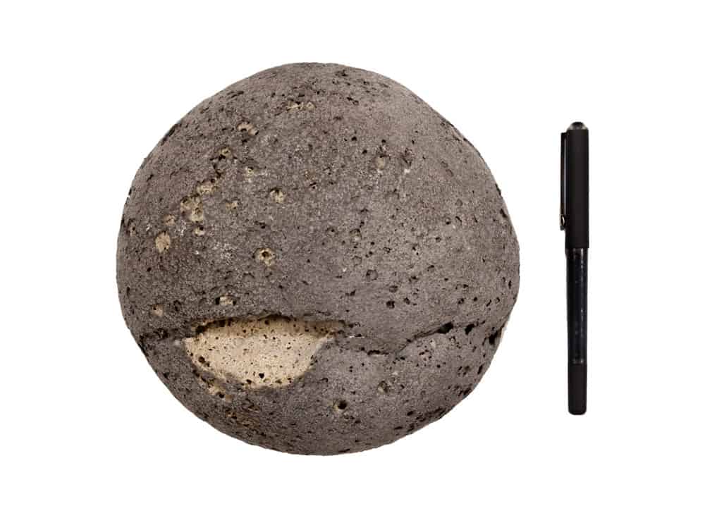 Cobblestone faux rock shown to scale with pen